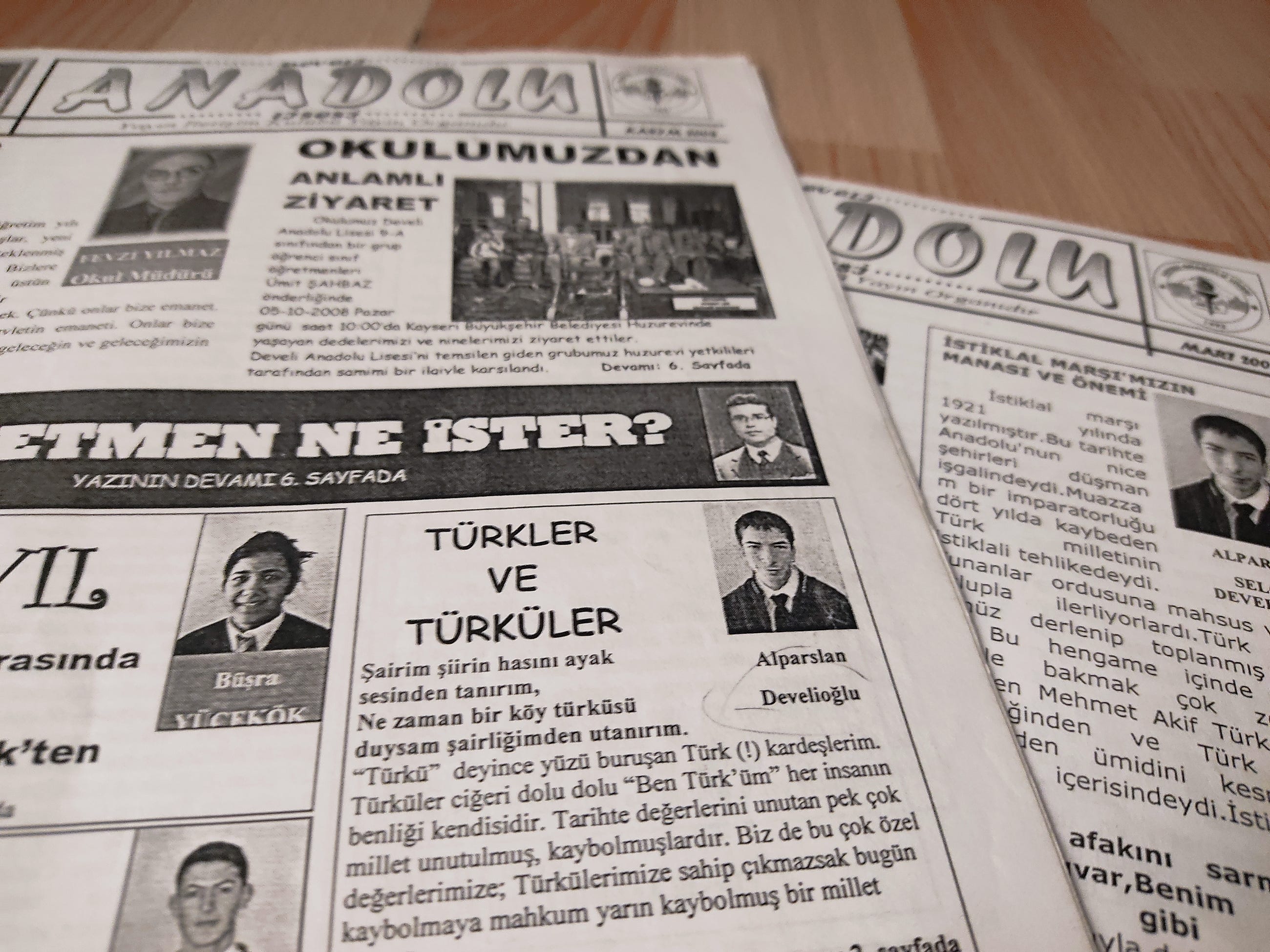 Newspaper pages in Turkish featuring headlines, portrait photographs, and article text.