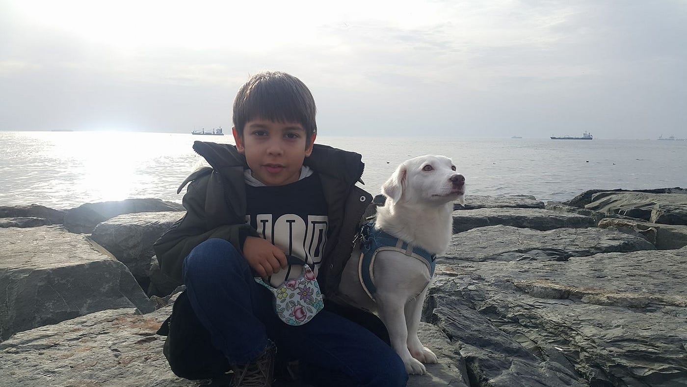 Photo by Author (Author’s dog and nephew)
